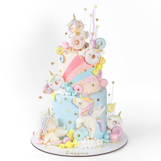 Дитячий торт з Єдиноріжками та смаколиками 2-х ярусний Дитячий торт з Єдиноріжками та смаколиками 2-х ярусний